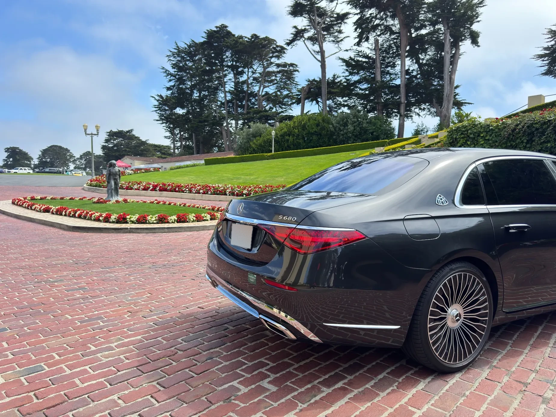 Maybach on landscaped brick drive in California